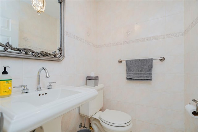 237 Swinnerton St, Staten Island, NY 10307 - half bathroom featuring a sink, toilet, and backsplash