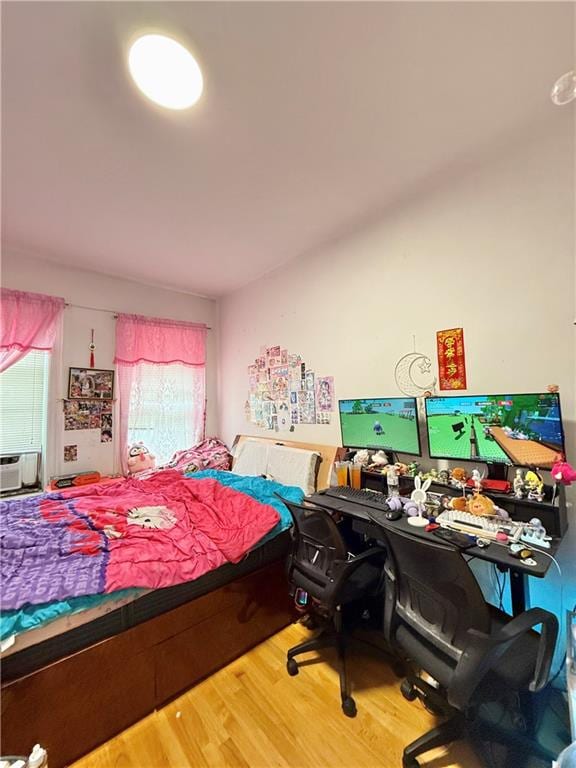 1641 82nd St, Brooklyn, NY 11214 - bedroom featuring wood finished floors and an office area