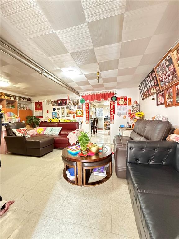 1641 82nd St, Brooklyn, NY 11214 - living area featuring tile patterned floors