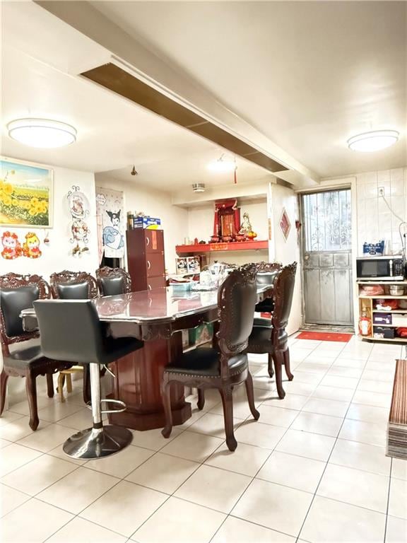 1641 82nd St, Brooklyn, NY 11214 - bar area with stainless steel microwave and light tile patterned floors