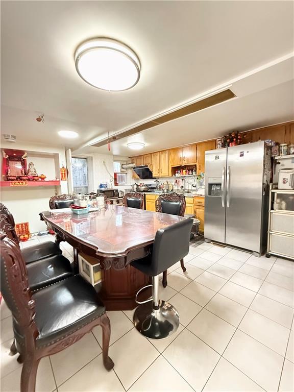 1641 82nd St, Brooklyn, NY 11214 - dining space with light tile patterned flooring