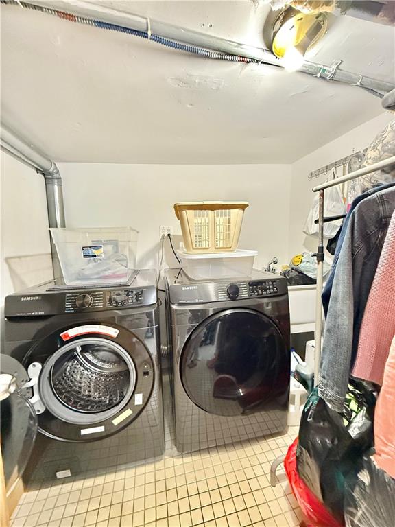 1871 W 8th St, Brooklyn, NY 11223 - laundry room featuring separate washer and dryer and tile patterned floors