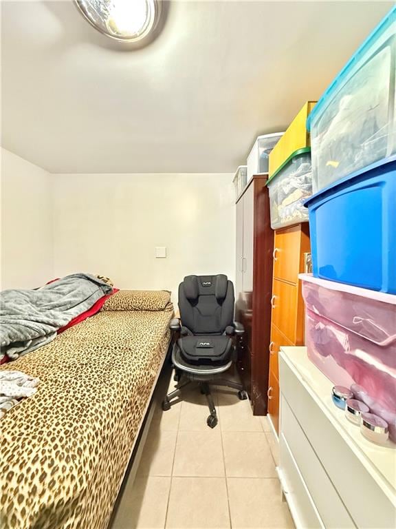 1871 W 8th St, Brooklyn, NY 11223 - bedroom with light tile patterned floors and an office area