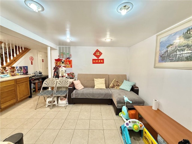 1871 W 8th St, Brooklyn, NY 11223 - living area featuring light tile patterned flooring and stairs