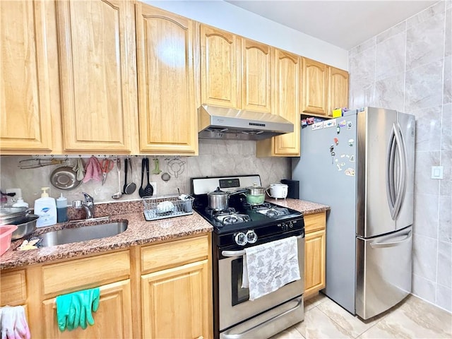 1871 W 8th St, Brooklyn, NY 11223 - kitchen with appliances with stainless steel finishes, under cabinet range hood, a sink, light brown cabinetry, and tile walls