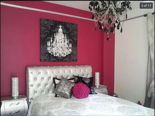 1440 Midland Ave Unit 1D, Bronxville, NY 10108 - bedroom featuring a chandelier