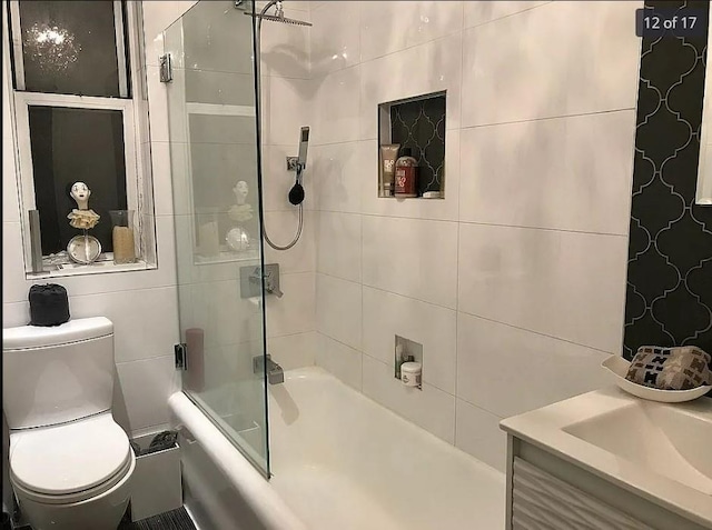 1440 Midland Ave Unit 1D, Bronxville, NY 10108 - full bath featuring shower / bath combination with glass door, toilet, and vanity