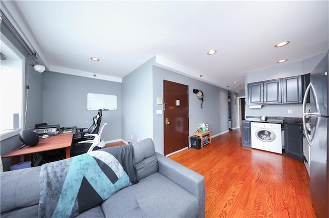 2543 W 16th St Unit C2, Brooklyn, NY 11214 - living area featuring washer / dryer, light wood-style flooring, recessed lighting, an office area, and baseboards