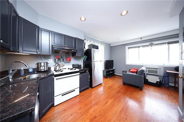 2543 W 16th St Unit C2, Brooklyn, NY 11214 - kitchen featuring gas range gas stove, freestanding refrigerator, under cabinet range hood, a sink, and recessed lighting
