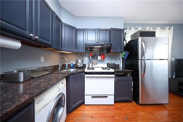 2543 W 16th St Unit C2, Brooklyn, NY 11214 - kitchen featuring washer / dryer, freestanding refrigerator, white gas range, under cabinet range hood, and a sink