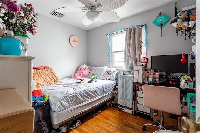 27 Bascom Pl, Staten Island, NY 10314 - bedroom featuring wood finished floors and a ceiling fan