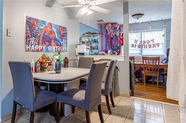 27 Bascom Pl, Staten Island, NY 10314 - dining space with tile patterned flooring and ceiling fan