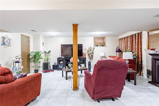 27 Bascom Pl, Staten Island, NY 10314 - living room with a fireplace and light tile patterned floors
