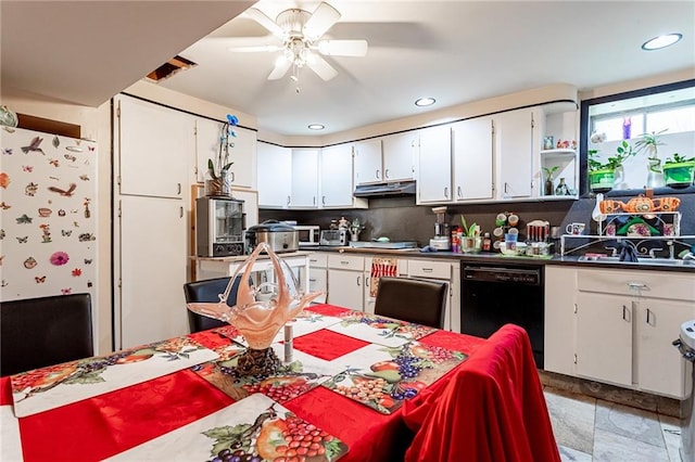 27 Bascom Pl, Staten Island, NY 10314 - kitchen featuring dishwasher, a ceiling fan, under cabinet range hood, dark countertops, and white cabinets