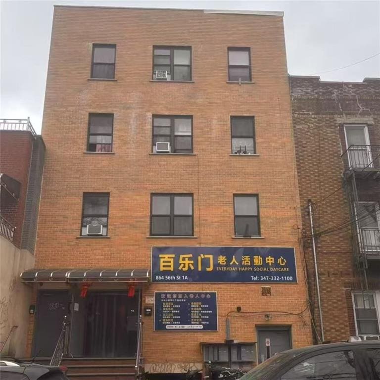 864 56th St Unit 2C, Brooklyn, NY 11220 - view of building exterior with cooling unit