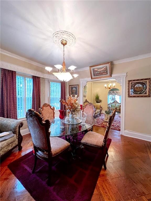 1566 E 46th St, Brooklyn, NY 11234 - dining area featuring a chandelier, crown molding, and baseboards