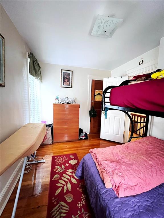 1566 E 46th St, Brooklyn, NY 11234 - bedroom with wood finished floors