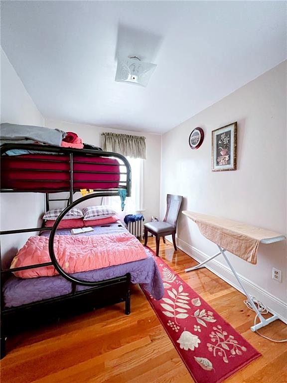 1566 E 46th St, Brooklyn, NY 11234 - bedroom with wood finished floors and baseboards