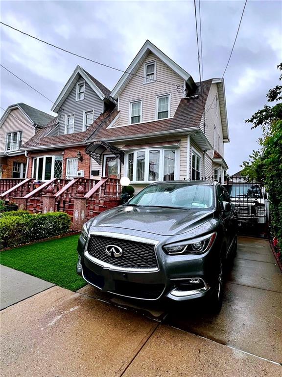 1566 E 46th St, Brooklyn, NY 11234 - view of front of house featuring a shingled roof