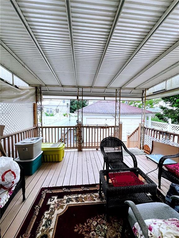 1566 E 46th St, Brooklyn, NY 11234 - wooden terrace with an outbuilding