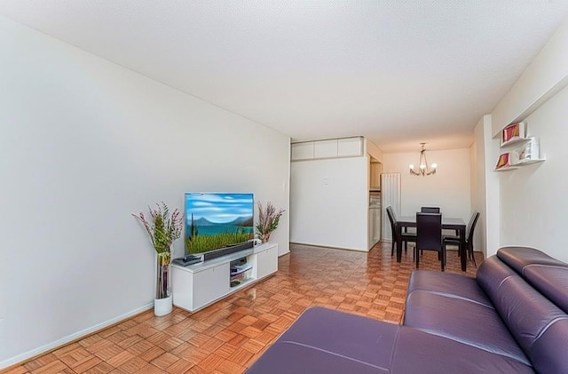 755 Narrows Rd N Unit 602, Staten Island, NY 10304 - living room featuring a chandelier