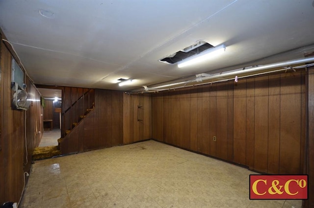 1927 E 34th St, Brooklyn, NY 11234 - finished below grade area with light floors, wood walls, and stairs