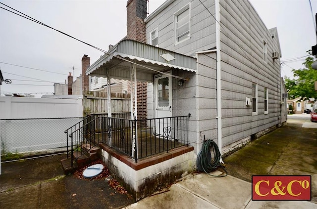1927 E 34th St, Brooklyn, NY 11234 - view of side of property with a chimney