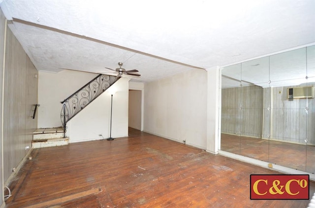 1927 E 34th St, Brooklyn, NY 11234 - unfurnished living room with hardwood / wood-style flooring, ceiling fan, and stairs