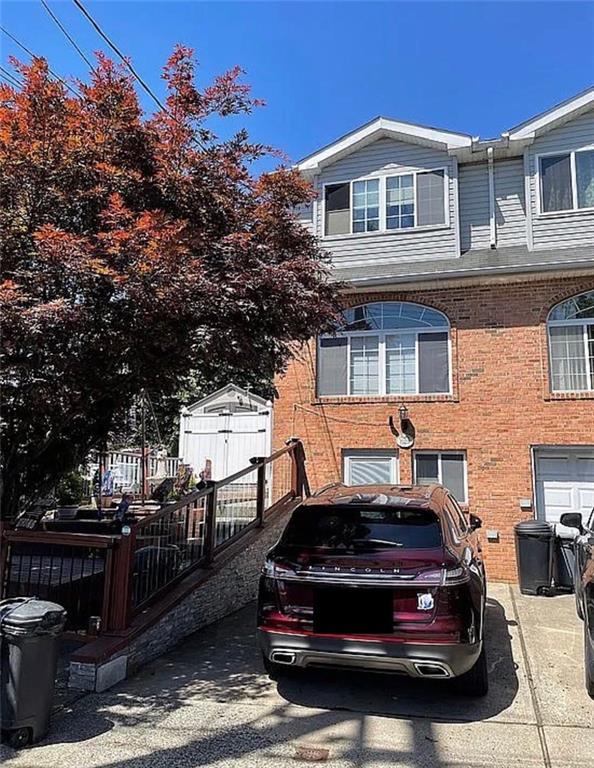 2054 Richomond Ave, New Springville, NY 10314 - view of front of home with brick siding