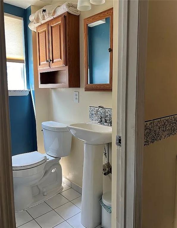 2054 Richomond Ave, New Springville, NY 10314 - bathroom with toilet and tile patterned flooring