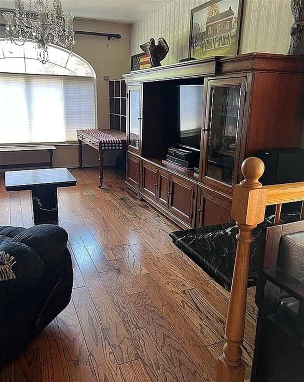 2054 Richomond Ave, New Springville, NY 10314 - living room featuring hardwood / wood-style flooring and a chandelier