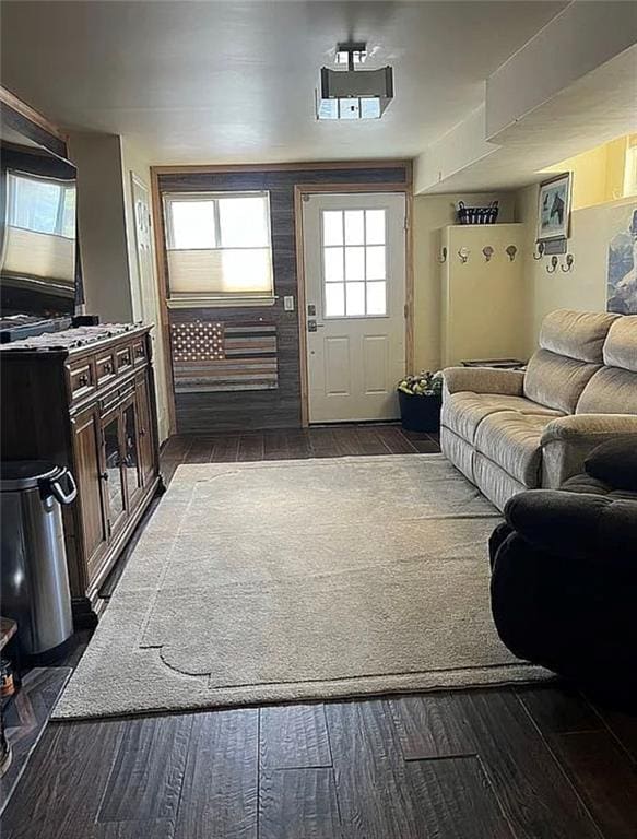 2054 Richomond Ave, New Springville, NY 10314 - living area with dark wood-style floors