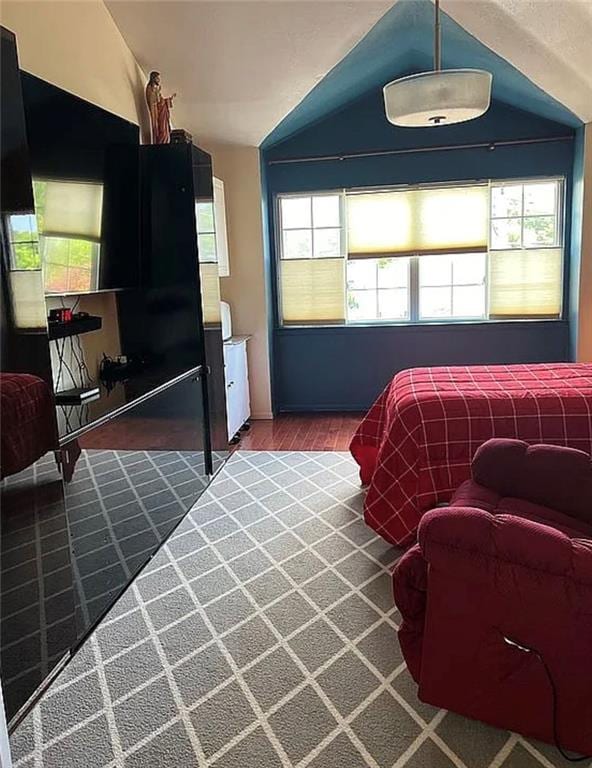2054 Richomond Ave, New Springville, NY 10314 - bedroom featuring lofted ceiling and wood finished floors
