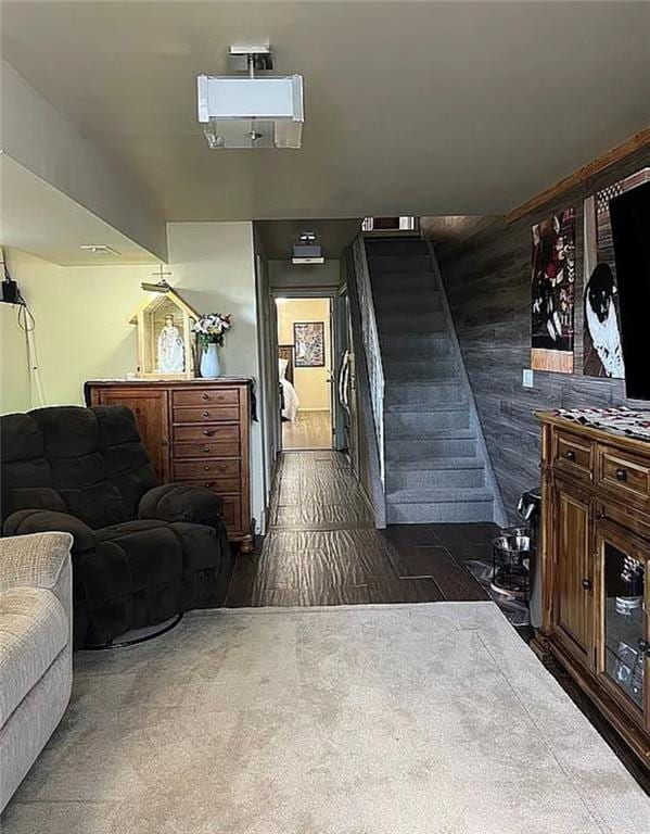 2054 Richomond Ave, New Springville, NY 10314 - living area featuring dark wood finished floors and stairway