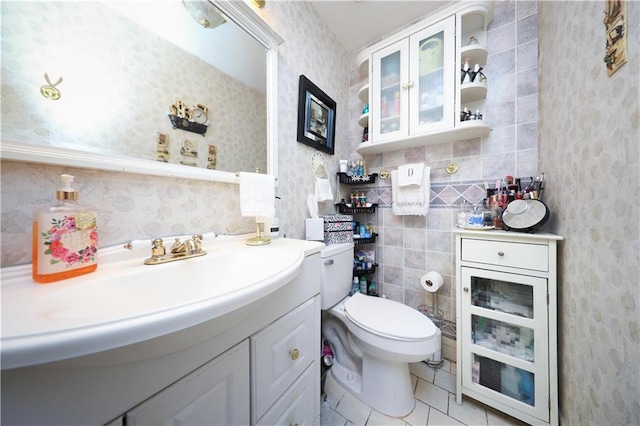 53 Marisa Cir, Staten Island, NY 10309 - half bathroom with vanity, tile patterned flooring, and wallpapered walls