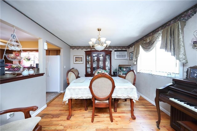 53 Marisa Cir, Staten Island, NY 10309 - dining area featuring a chandelier, wood finished floors, and a wall mounted AC