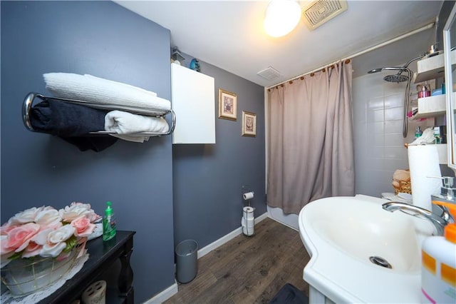 53 Marisa Cir, Staten Island, NY 10309 - full bathroom with wood finished floors and a shower with curtain