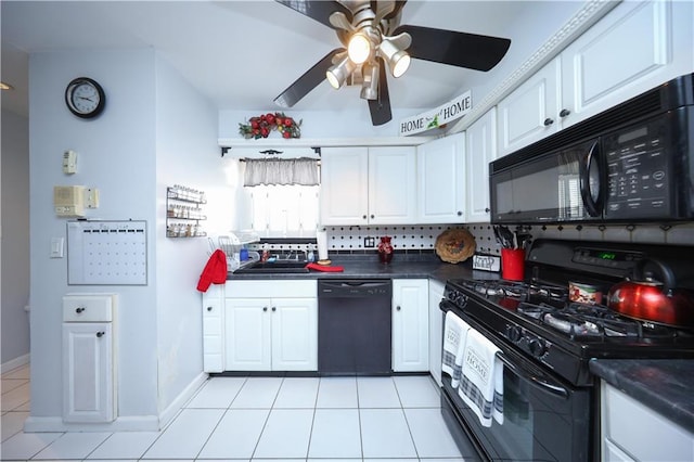53 Marisa Cir, Staten Island, NY 10309 - kitchen with black appliances, white cabinets, ceiling fan, light tile patterned floors, and dark countertops