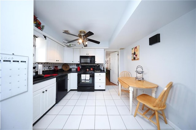 53 Marisa Cir, Staten Island, NY 10309 - kitchen featuring black appliances, dark countertops, a ceiling fan, white cabinets, and decorative backsplash