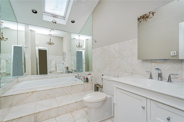 284 Todt Hill Rd, Staten Island, NY 10314 - full bathroom with a chandelier, a bath, vanity, a skylight, and tile walls