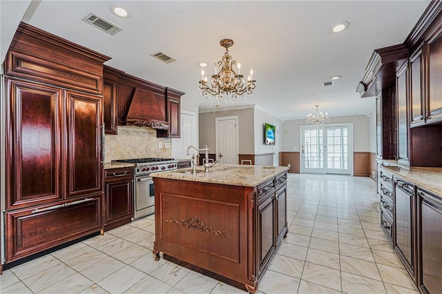 284 Todt Hill Rd, Staten Island, NY 10314 - kitchen featuring a chandelier, premium appliances, light marble finish floors, recessed lighting, and custom range hood