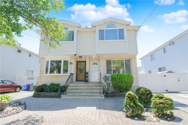 88 Jumel St, Staten Island, NY 10308 - view of property with brick siding, a gate, and entry steps