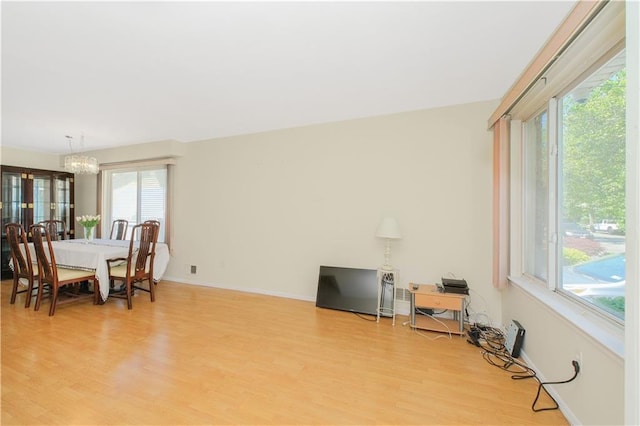 88 Jumel St, Staten Island, NY 10308 - dining area featuring light wood-style floors and a chandelier