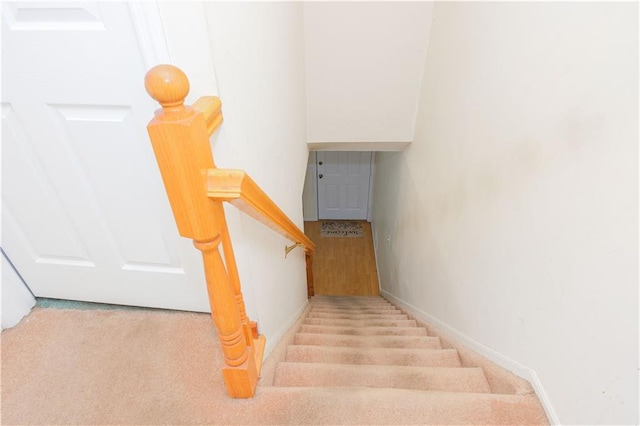 88 Jumel St, Staten Island, NY 10308 - staircase featuring baseboards and carpet