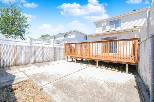 88 Jumel St, Staten Island, NY 10308 - rear view of house with a fenced backyard, a patio area, and a wooden deck