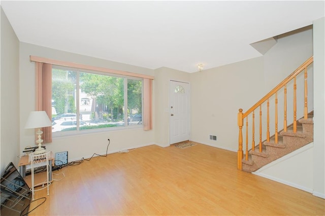88 Jumel St, Staten Island, NY 10308 - entryway with wood finished floors and stairway