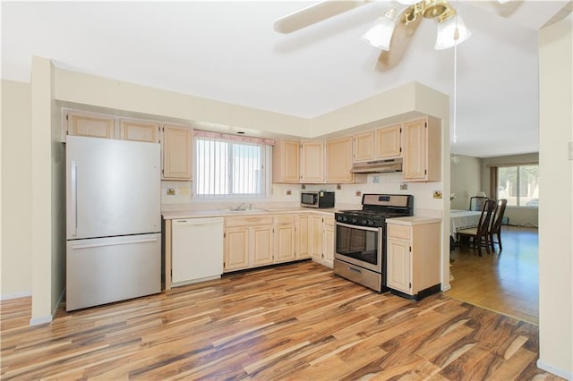 88 Jumel St, Staten Island, NY 10308 - kitchen with appliances with stainless steel finishes, light wood-style floors, under cabinet range hood, light countertops, and ceiling fan
