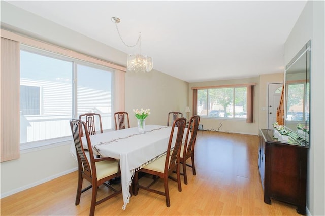 88 Jumel St, Staten Island, NY 10308 - dining space with light wood-type flooring and a chandelier