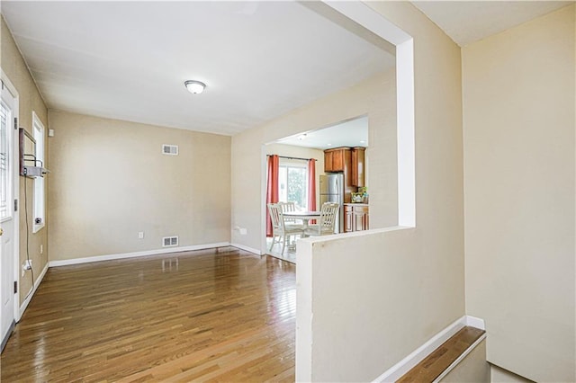 483 Van Duzer St, Staten Island, NY 10301 - spare room featuring wood finished floors and baseboards