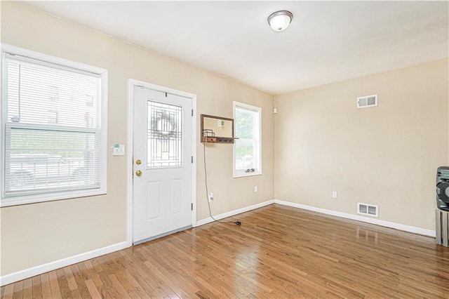 483 Van Duzer St, Staten Island, NY 10301 - foyer entrance featuring baseboards and wood-type flooring